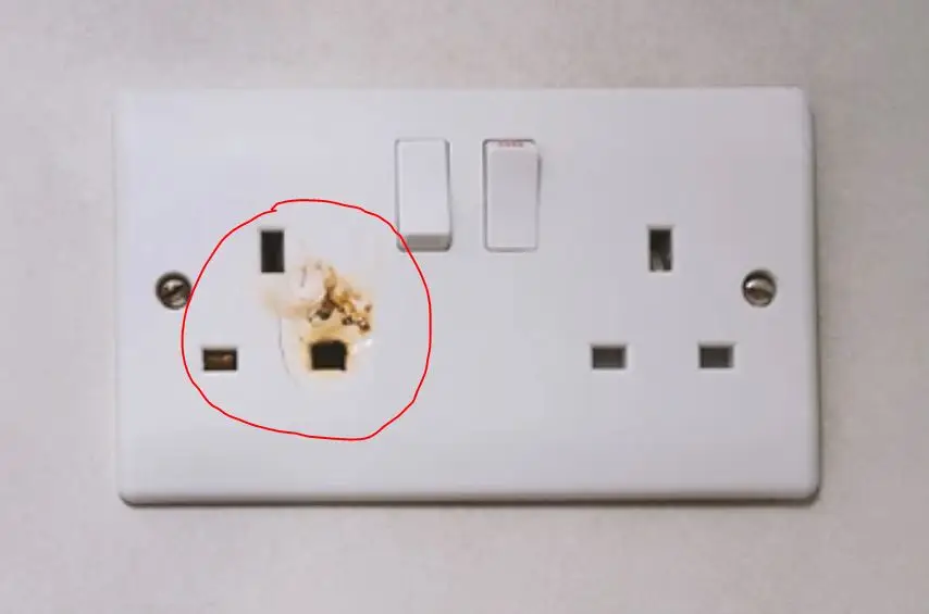 Fig 1- Burn Marks on an Overloaded Outlet